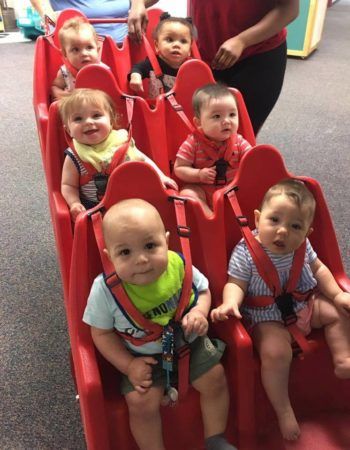 toddlers_in_bye-bye_buggie_rogys_learning_place_big_hollow_peoria_il-350x450