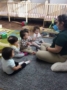 toddlers_in_circle_time_with_teacher_at_cadence_academy_preschool_cypress_houston_tx-333x450