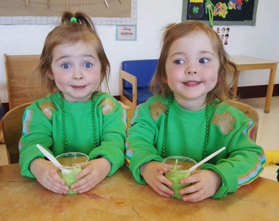 twins_enjoying_christmas_food_at_cadence_academy_preschool_the_colony_tx-567x450