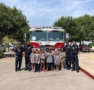 visit_from_allen_firefighters_at_cadence_academy_preschool_allen_tx-472x450