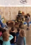 visit_from_firefighter_fredericksburg_childrens_academy_fredericksburg_va-311x450
