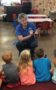 visitor_showing_students_a_tarantula_canterbury_academy_at_shawnee_crossings_shawnee_ks-278x450