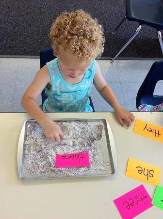 writing_numbers_in_sand_activity_adventures_in_learning_naperville_il-336x450