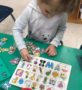 a child playing a letter association game