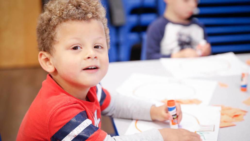 a child doing a crafts project