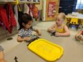 preschool_girls_playing_with_fish_winwood_childrens_center_south_riding_va-600x450