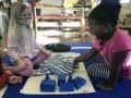 two children playing inside