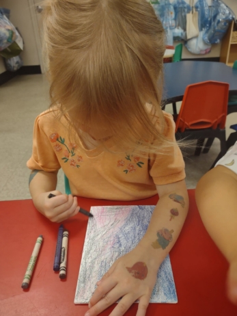 child learning with hands on activity at fort thomas