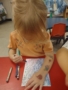 child learning with hands on activity at fort thomas