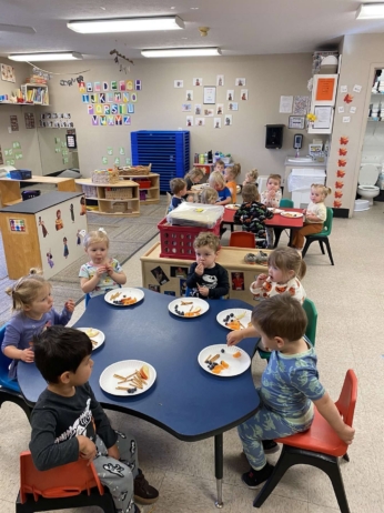 children sitting at tables at fort thomas classroom