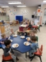children sitting at tables at fort thomas classroom
