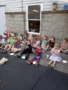 children sitting in costumes outside in fort thomas