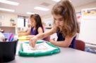 Children doing a learning exercise indoors