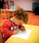 A child drawing indoors