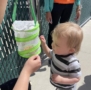 child looking at butterfly at cadence academy preschool draper