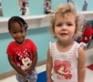 children posing for a photo indoors