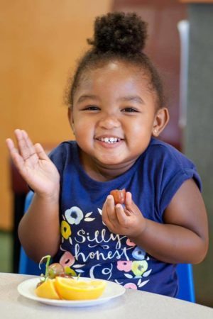 an image of a child eating