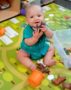 a baby playing indoors