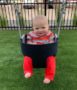 a baby in a swing