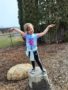 an image of a child playing outside