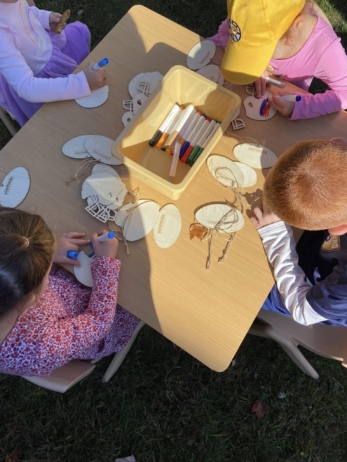 Children doing arts and crafts at preschool and daycare at cadence academy preschool 452 south street
