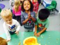 a group of children playing indoors
