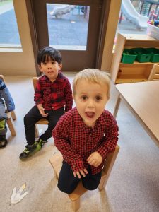 a group of children playing indoors