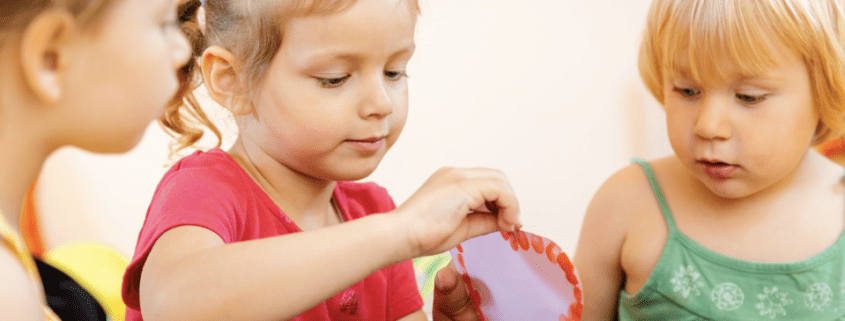 children doing crafts indoors