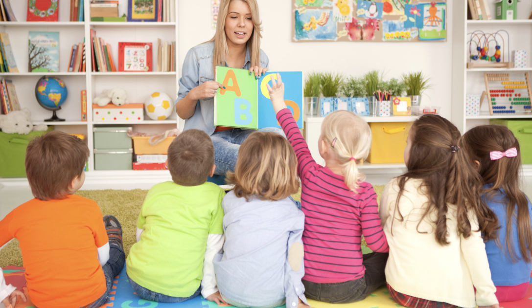 a teacher reading to children