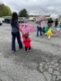 children holding hands with teachers as they walk outside at cadence academy preschool 453 pond