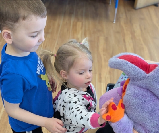 children learning about dentists and teeth with stuffed animal at cadence academy preschool 454 eliot