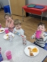 children snacking in class at cadence academy preschool 454 eliot