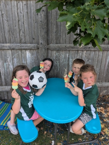 children snacking at soccer at cadence academy preschool 454 eliot