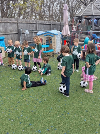 children playing soccer after school at cadence academy preschool 454 eliot