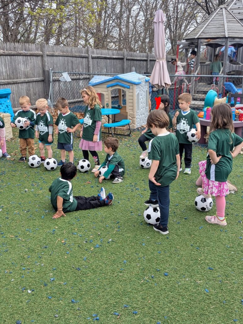 children playing soccer after school at cadence academy preschool 454 eliot