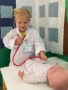 female child playing as doctor learning at little big minds uptown