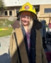 female child wearing firefighter's gear at little big minds uptown