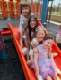children on slide outside on playground at Little Big Minds Kennedy