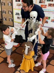 male and female children learning from doctor at little big minds uptown