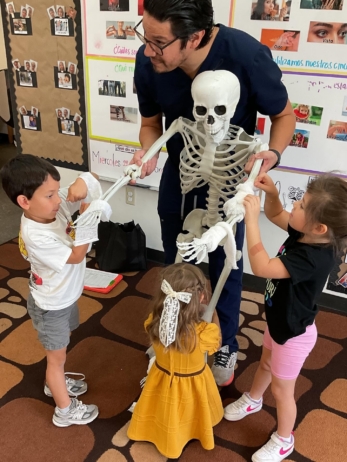 male and female children learning from doctor at little big minds uptown