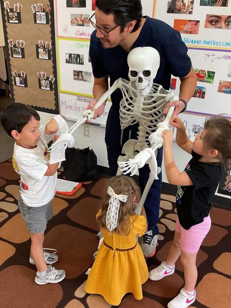 male and female children learning from doctor at little big minds uptown