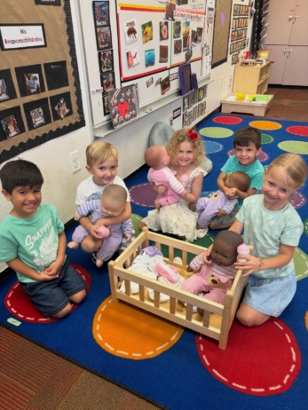 Children playing inside using imaginative play at Little Big Minds Preschool Kennedy