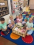 Children playing inside using imaginative play at Little Big Minds Preschool Kennedy