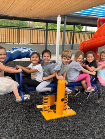 Children playing outside and having fun at Little Big Minds Kennedy