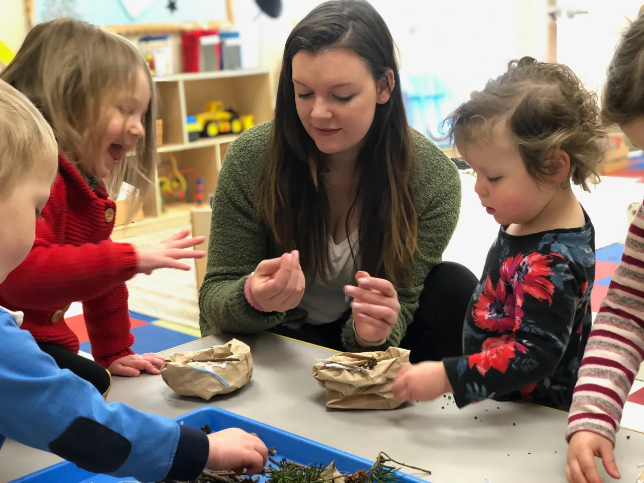 a teacher instructing children