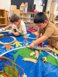 Children playing inside using toys at Little Big Minds Kennedy
