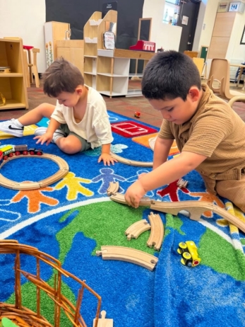 Children playing inside using toys at Little Big Minds Kennedy