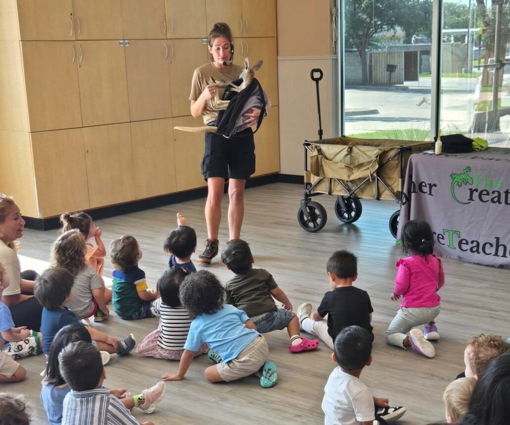 A photo of children watching kangaroo inside of preschool and daycare Hebron 336