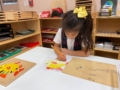 child filling in worksheet at preschool and daycare at 339 Virginia Parkway