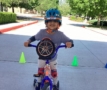 child riding bike at preschool and daycare at 339 Viriginia Parkway